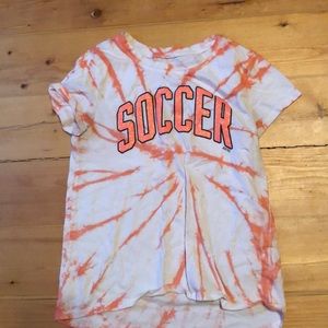 White and orange tie dye shirt